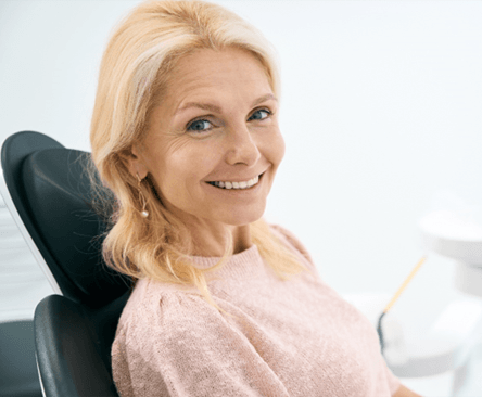 Woman smiling in dental chair