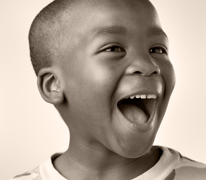 Young boy grinning