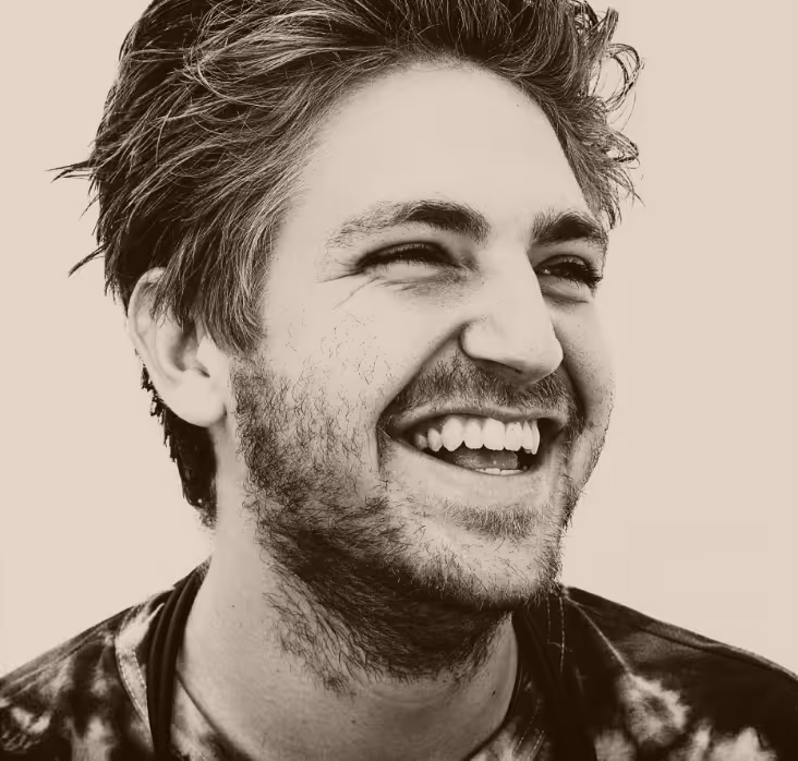 Smiling young man with beard