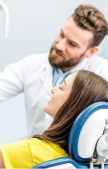 Dentist and dental patient discussing dental treatment plan