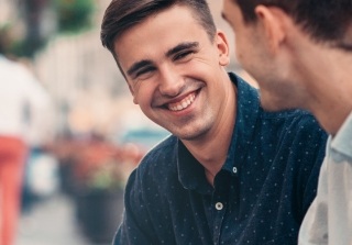 Man with flawless smile after cosmetic dentistry