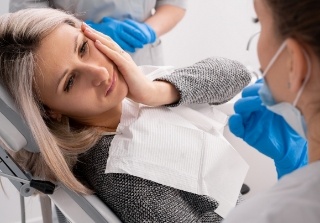 Woman discussing orthodontic options with dentist