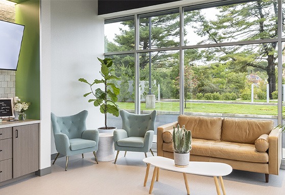 Loveseat and two chairs in waiting area